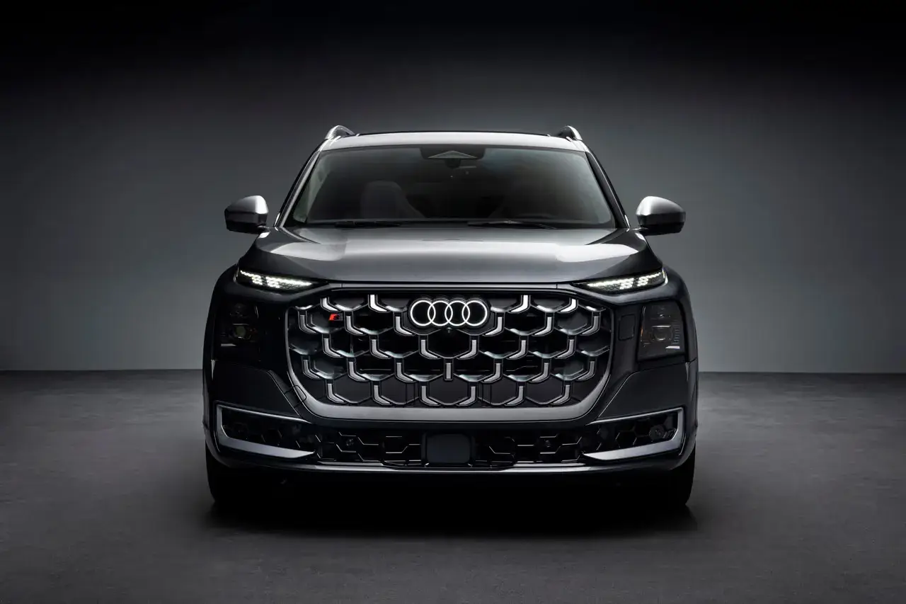 AUDI DEBUTS FULL SIZE Q9 SUV FAMILY image explaining Audi's new Q9 and SQ9 vehicle models, including engine performance, dimensions, exterior light projectors, and seating layouts. (image 2 of 14)