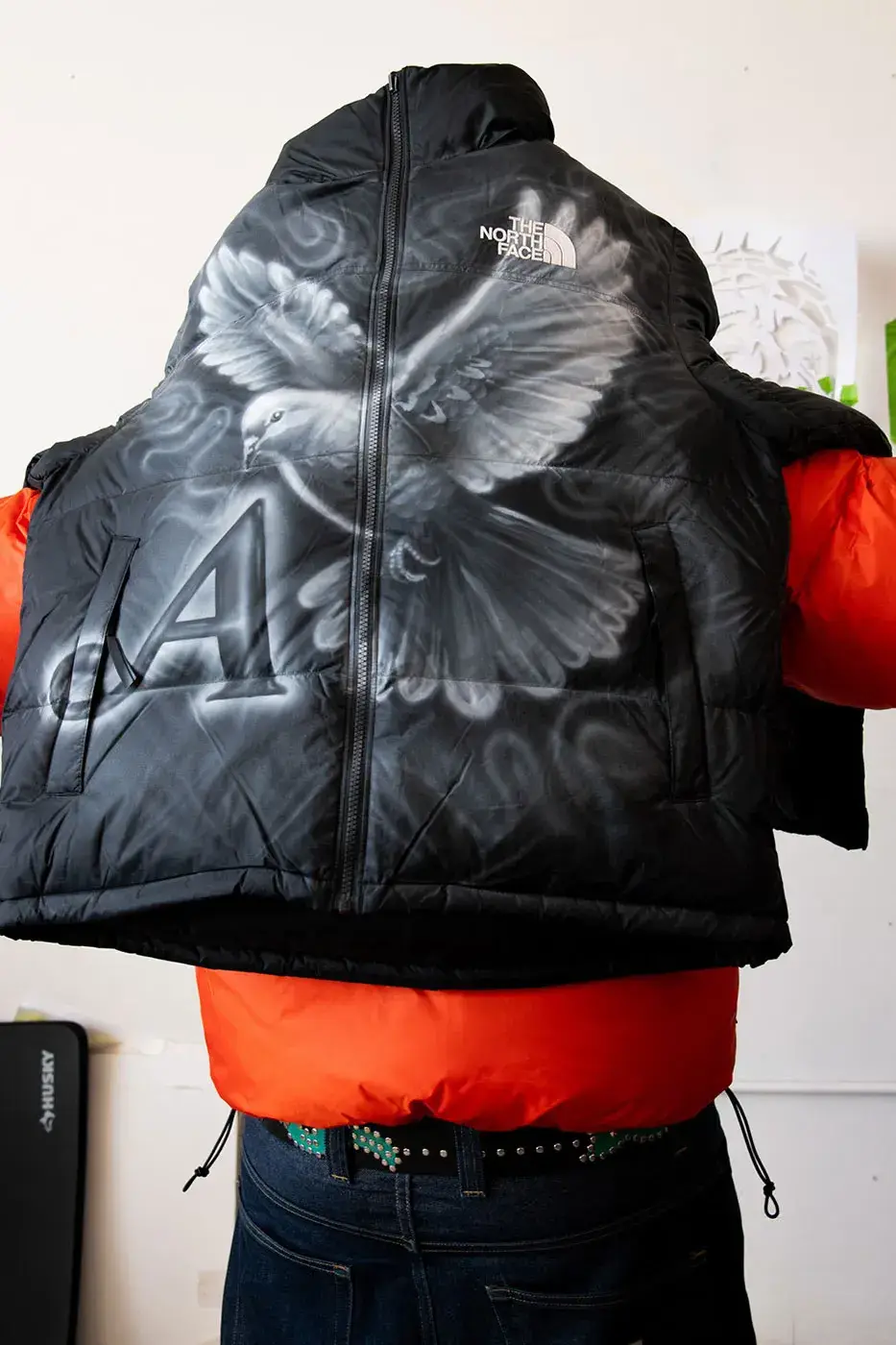AWAKE NY AND THE NORTH FACE RELEASE 50 CUSTOM NUPTSE JACKETS image of Awake NY and The North Face made 50 hand-customized Nuptse jackets with artists Omi and Alehsy Lambo. Part of the run goes on sale on the Awake NY website on Monday, October 19, 2026, at 1 p.m. (image 2 of 10)