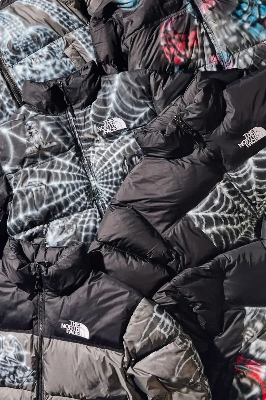 AWAKE NY AND THE NORTH FACE RELEASE 50 CUSTOM NUPTSE JACKETS image of Awake NY and The North Face made 50 hand-customized Nuptse jackets with artists Omi and Alehsy Lambo. Part of the run goes on sale on the Awake NY website on Monday, October 19, 2026, at 1 p.m. (image 9 of 10)