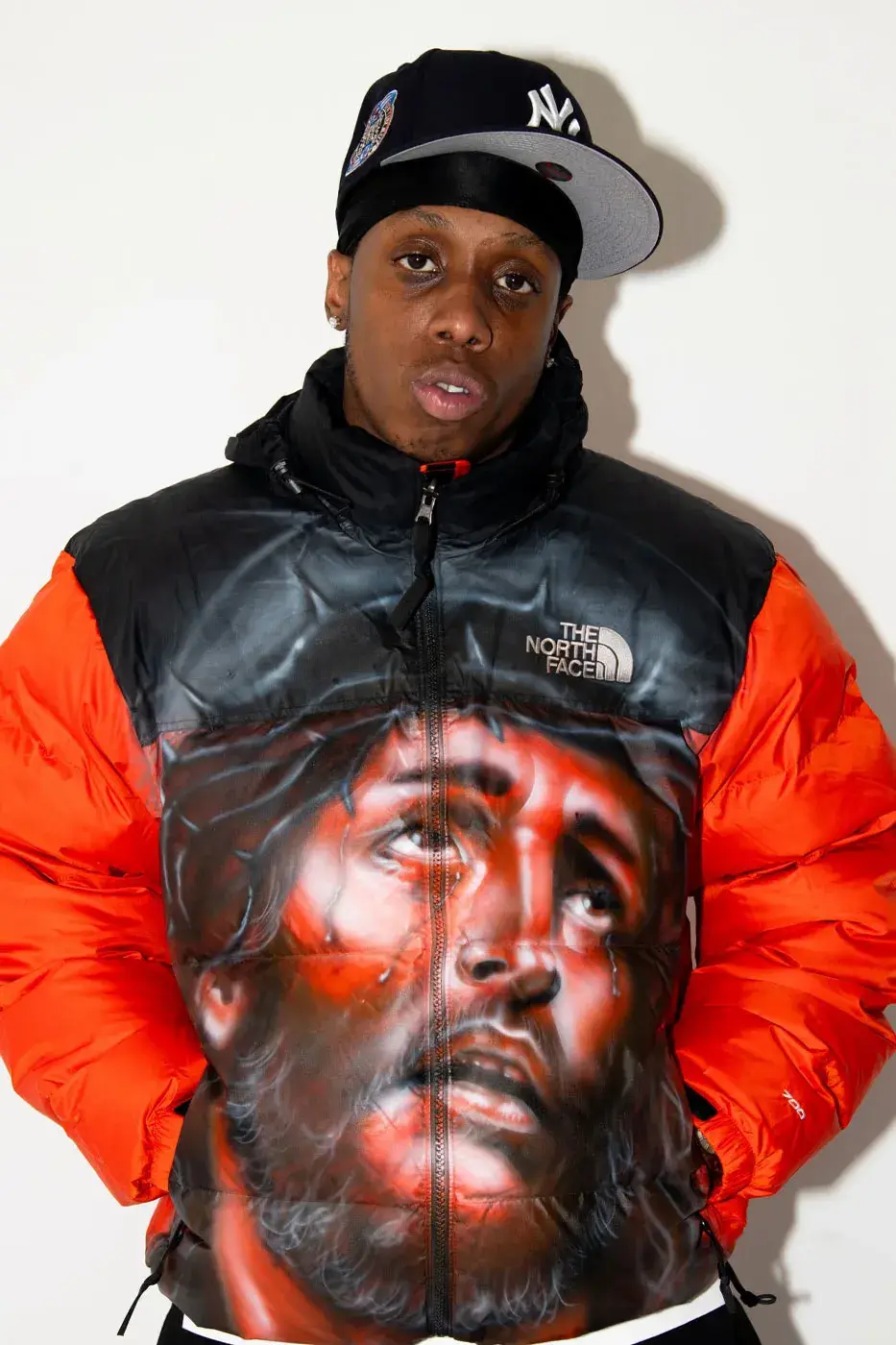 AWAKE NY AND THE NORTH FACE RELEASE 50 CUSTOM NUPTSE JACKETS image of Awake NY and The North Face made 50 hand-customized Nuptse jackets with artists Omi and Alehsy Lambo. Part of the run goes on sale on the Awake NY website on Monday, October 19, 2026, at 1 p.m. (image 4 of 10)
