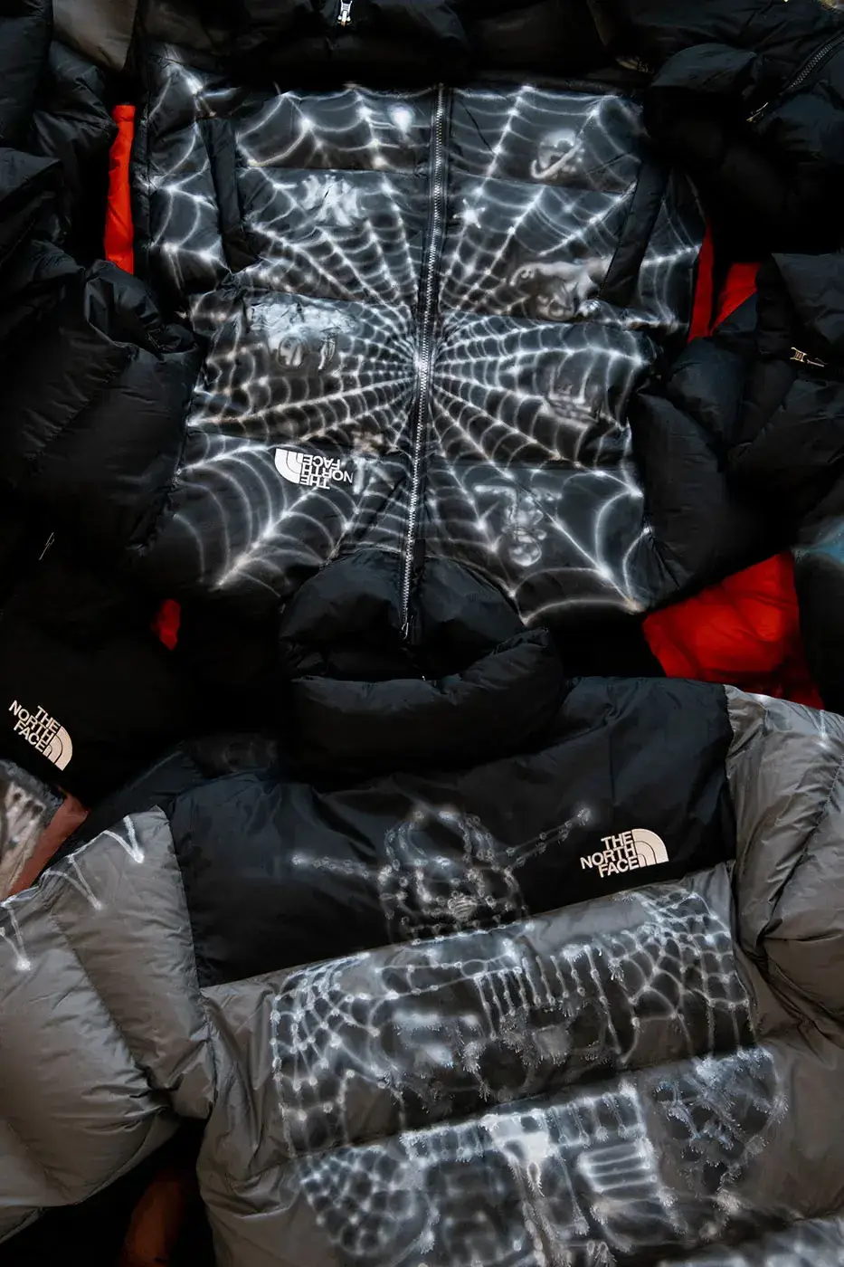 AWAKE NY AND THE NORTH FACE RELEASE 50 CUSTOM NUPTSE JACKETS image of Awake NY and The North Face made 50 hand-customized Nuptse jackets with artists Omi and Alehsy Lambo. Part of the run goes on sale on the Awake NY website on Monday, October 19, 2026, at 1 p.m. (image 8 of 10)