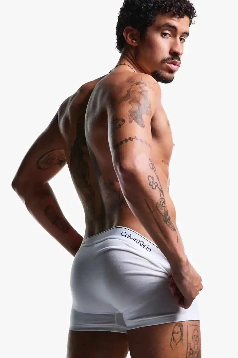 Calvin Klein Bad Bunny wearing Calvin Klein underwear from the Icon Cotton Stretch line, photographed in Puerto Rico. (image 4 of 5)