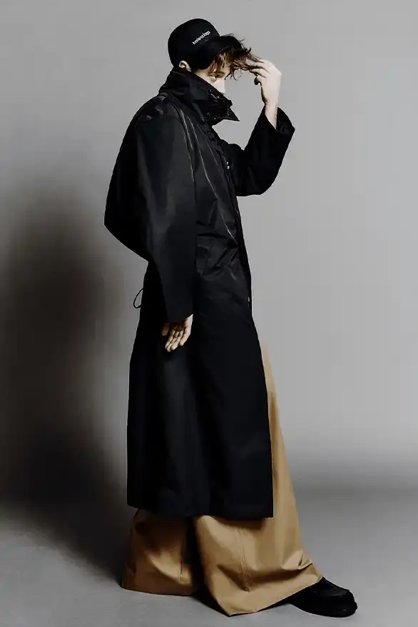 BALENCIAGA PARTNERS WITH NBA FOR FALL 2026 Balenciaga Fall 2026 collection features NBA collaboration with athletic wear, formal tailoring, and Manolo Blahnik footwear partnership under creative director Pierpaolo Piccioli. (image 40 of 52)