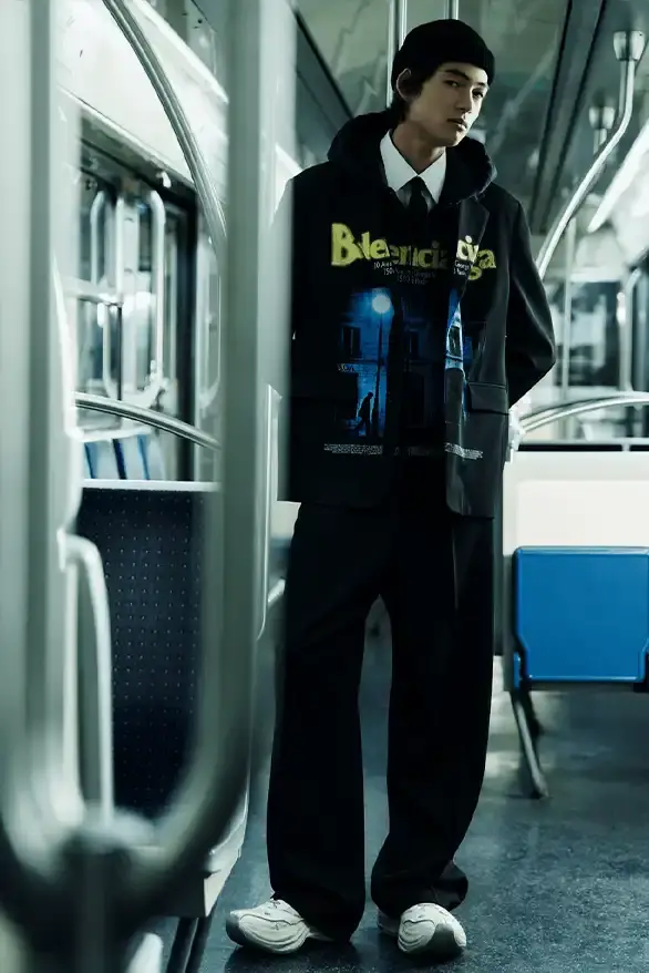 BALENCIAGA PARTNERS WITH NBA FOR FALL 2026 Balenciaga Fall 2026 collection features NBA collaboration with athletic wear, formal tailoring, and Manolo Blahnik footwear partnership under creative director Pierpaolo Piccioli. (image 49 of 52)