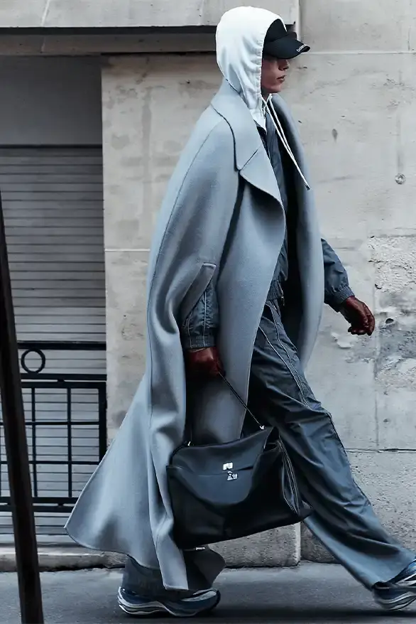 BALENCIAGA PARTNERS WITH NBA FOR FALL 2026 Balenciaga Fall 2026 collection features NBA collaboration with athletic wear, formal tailoring, and Manolo Blahnik footwear partnership under creative director Pierpaolo Piccioli. (image 22 of 52)
