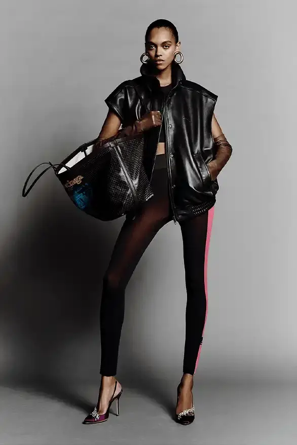 BALENCIAGA PARTNERS WITH NBA FOR FALL 2026 Balenciaga Fall 2026 collection features NBA collaboration with athletic wear, formal tailoring, and Manolo Blahnik footwear partnership under creative director Pierpaolo Piccioli. (image 42 of 52)