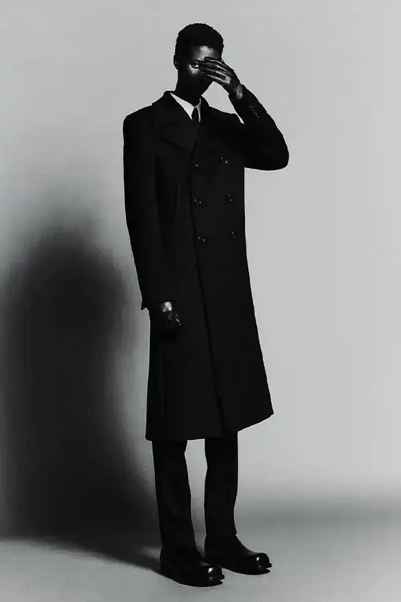 BALENCIAGA PARTNERS WITH NBA FOR FALL 2026 Balenciaga Fall 2026 collection features NBA collaboration with athletic wear, formal tailoring, and Manolo Blahnik footwear partnership under creative director Pierpaolo Piccioli. (image 11 of 52)