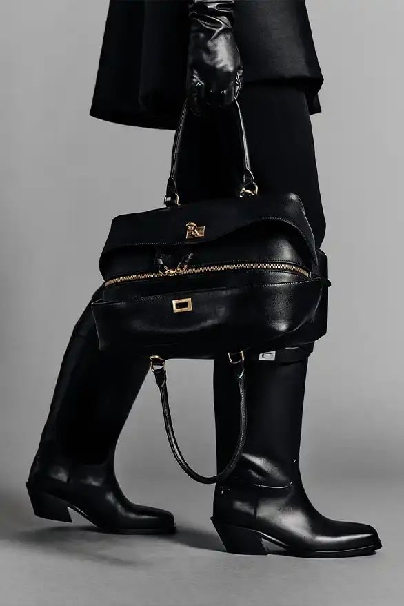 BALENCIAGA PARTNERS WITH NBA FOR FALL 2026 Balenciaga Fall 2026 collection features NBA collaboration with athletic wear, formal tailoring, and Manolo Blahnik footwear partnership under creative director Pierpaolo Piccioli. (image 46 of 52)