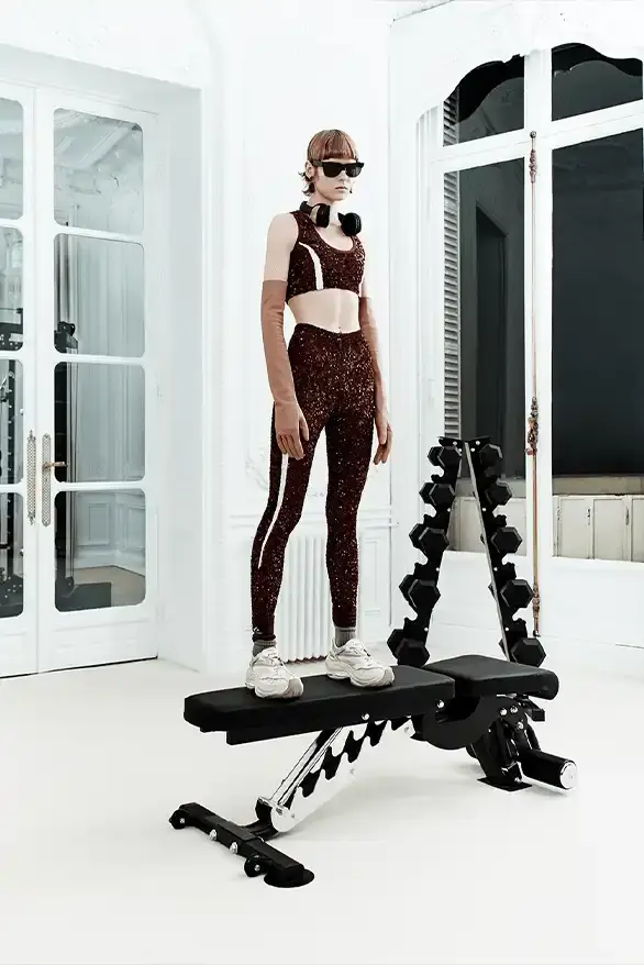 BALENCIAGA PARTNERS WITH NBA FOR FALL 2026 Balenciaga Fall 2026 collection features NBA collaboration with athletic wear, formal tailoring, and Manolo Blahnik footwear partnership under creative director Pierpaolo Piccioli. (image 20 of 52)