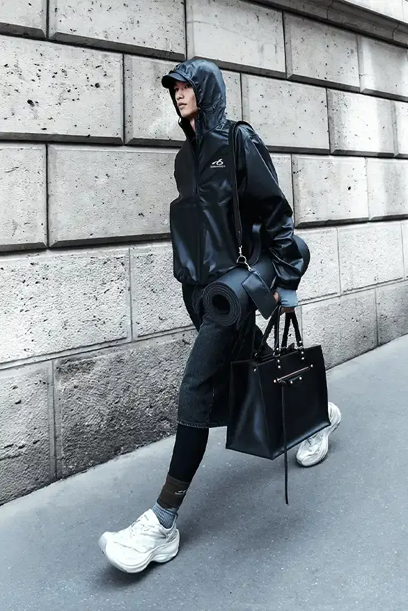 BALENCIAGA PARTNERS WITH NBA FOR FALL 2026 Balenciaga Fall 2026 collection features NBA collaboration with athletic wear, formal tailoring, and Manolo Blahnik footwear partnership under creative director Pierpaolo Piccioli. (image 37 of 52)