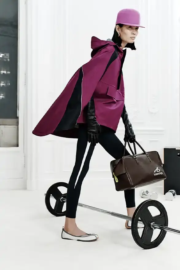 BALENCIAGA PARTNERS WITH NBA FOR FALL 2026 Balenciaga Fall 2026 collection features NBA collaboration with athletic wear, formal tailoring, and Manolo Blahnik footwear partnership under creative director Pierpaolo Piccioli. (image 21 of 52)