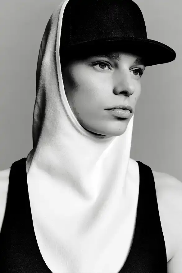 BALENCIAGA PARTNERS WITH NBA FOR FALL 2026 Balenciaga Fall 2026 collection features NBA collaboration with athletic wear, formal tailoring, and Manolo Blahnik footwear partnership under creative director Pierpaolo Piccioli. (image 26 of 52)