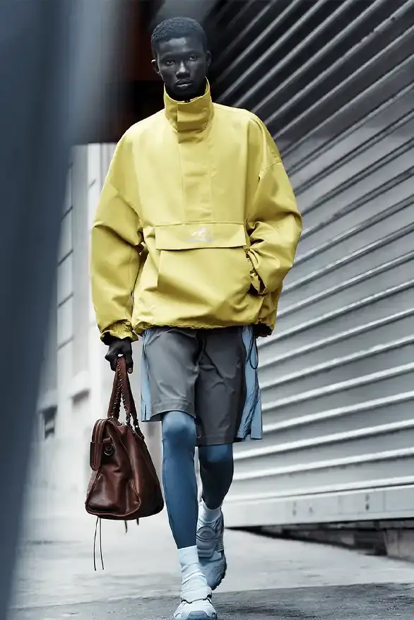 BALENCIAGA PARTNERS WITH NBA FOR FALL 2026 Balenciaga Fall 2026 collection features NBA collaboration with athletic wear, formal tailoring, and Manolo Blahnik footwear partnership under creative director Pierpaolo Piccioli. (image 23 of 52)