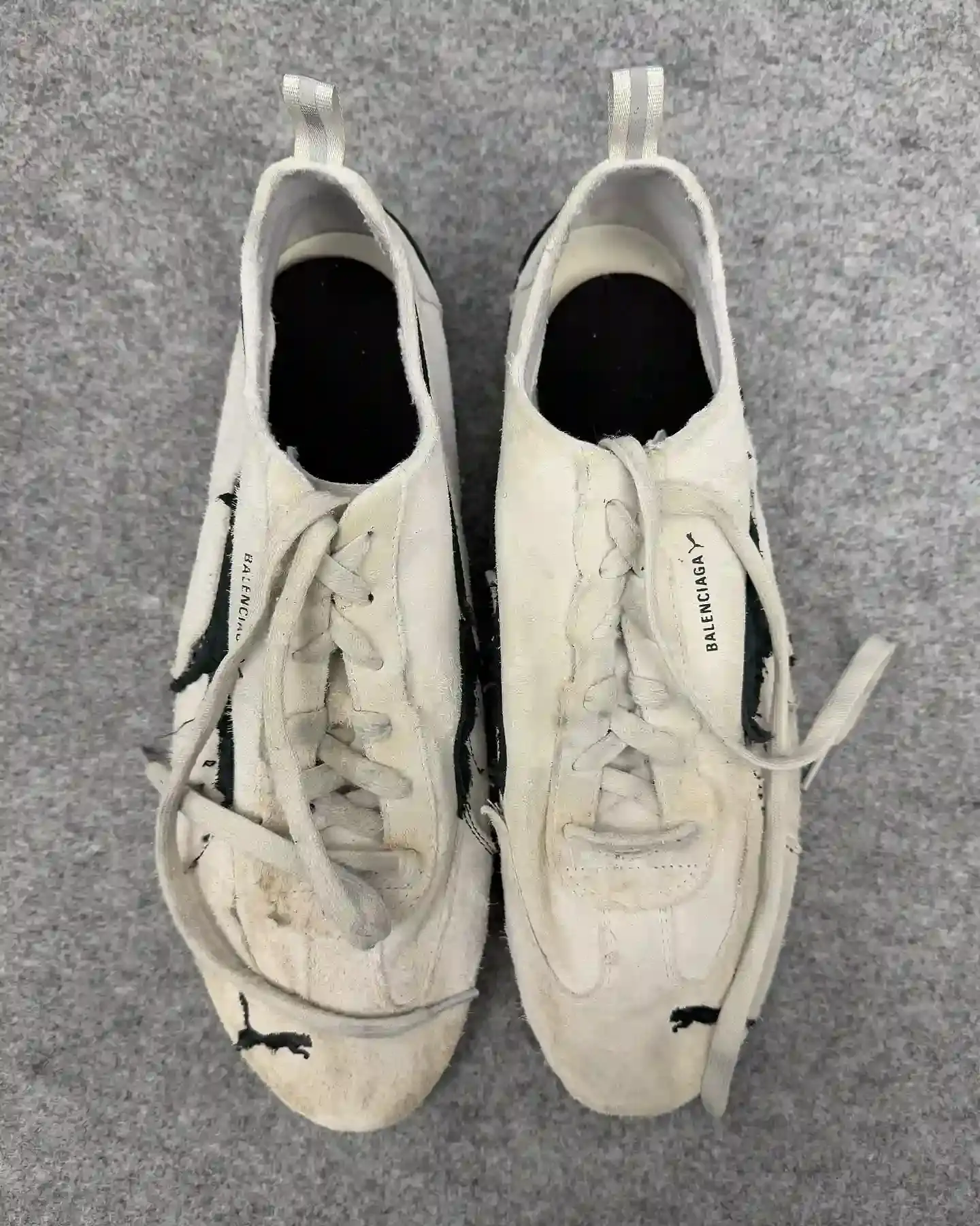 Via @myfacewheno_o Balenciaga's Winter 2025 runway show featuring the new PUMA collaboration, showcasing redesigned Speedcat shoes and oversized sportswear pieces that blend high fashion with athletic heritage (image 3 of 4)