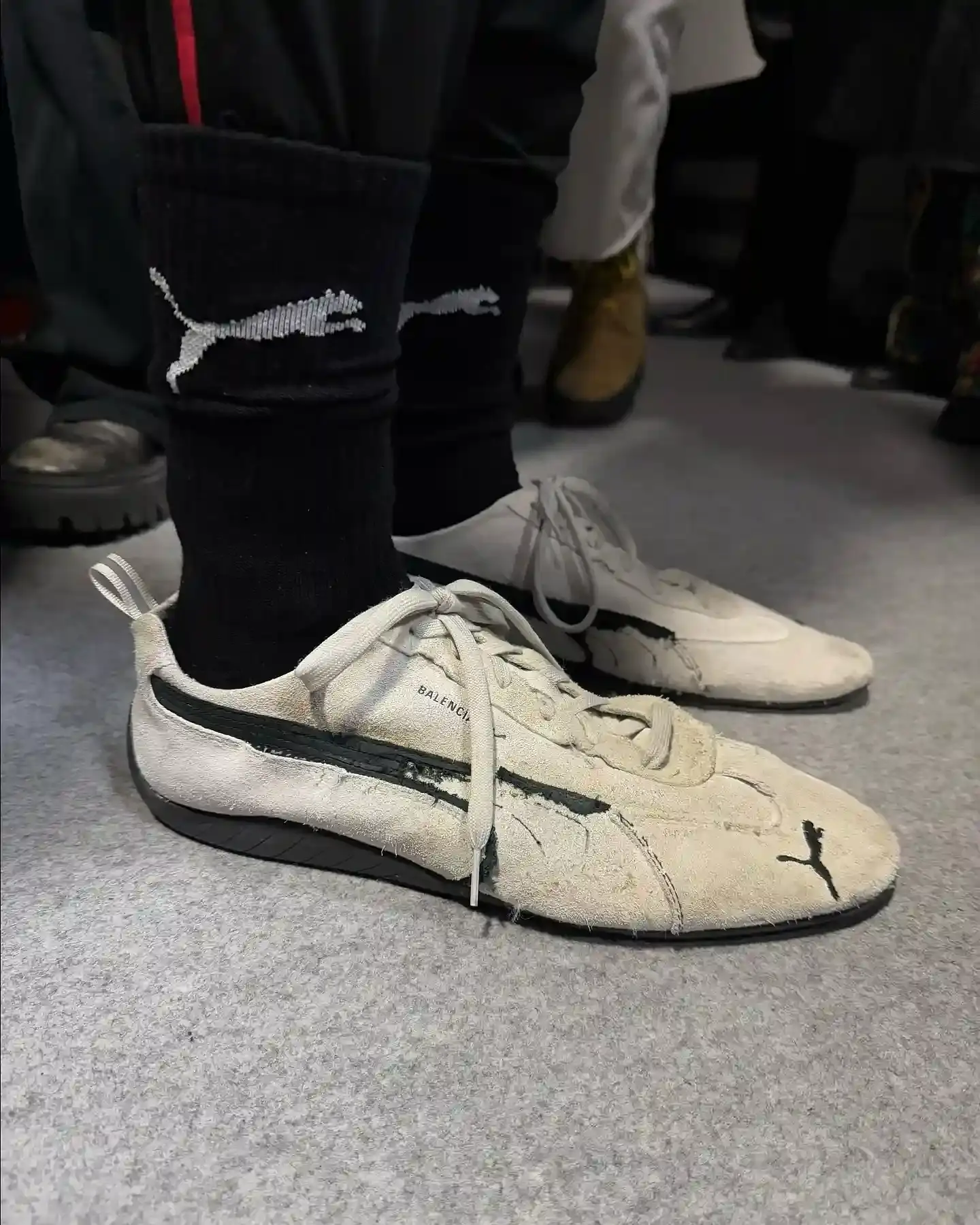 Via @myfacewheno_o Balenciaga's Winter 2025 runway show featuring the new PUMA collaboration, showcasing redesigned Speedcat shoes and oversized sportswear pieces that blend high fashion with athletic heritage