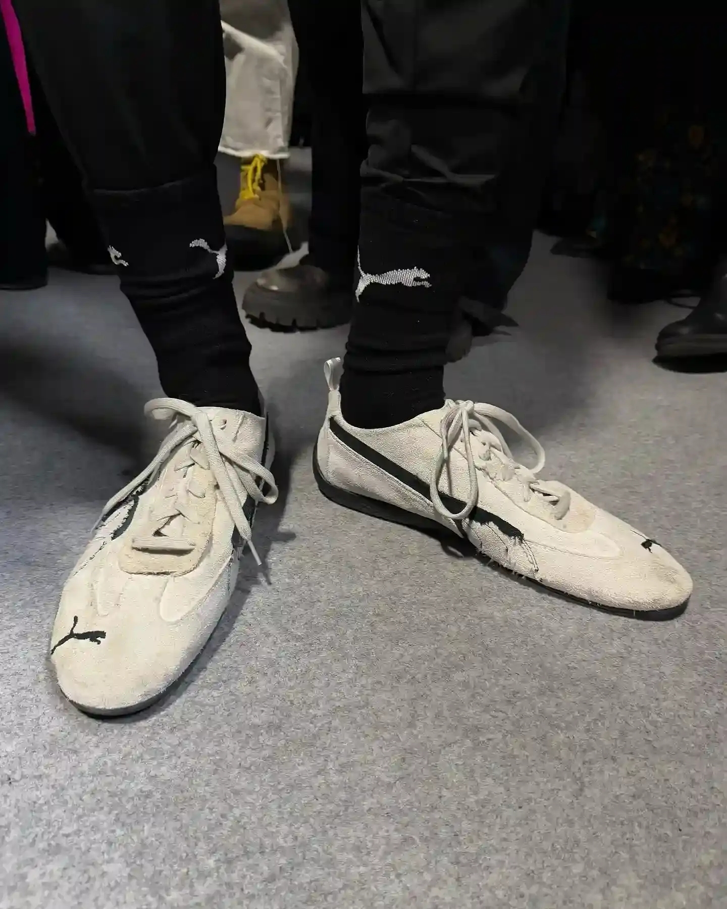 Via @myfacewheno_o Balenciaga's Winter 2025 runway show featuring the new PUMA collaboration, showcasing redesigned Speedcat shoes and oversized sportswear pieces that blend high fashion with athletic heritage (image 2 of 4)
