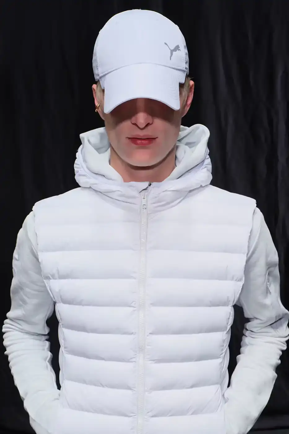 Balenciaga Balenciaga x PUMA collection display showing the Ultrasoft Speedcat sneakers in three colorways alongside tracksuits, outerwear pieces, and accessories arranged on a neutral background. (image 7 of 21)
