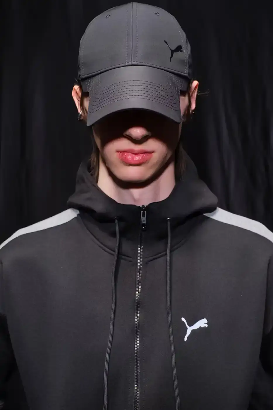 Balenciaga Balenciaga x PUMA collection display showing the Ultrasoft Speedcat sneakers in three colorways alongside tracksuits, outerwear pieces, and accessories arranged on a neutral background. (image 21 of 21)