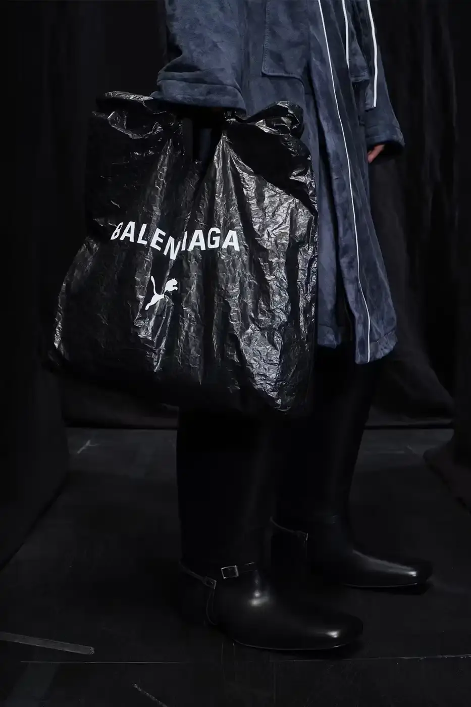 Balenciaga Balenciaga x PUMA collection display showing the Ultrasoft Speedcat sneakers in three colorways alongside tracksuits, outerwear pieces, and accessories arranged on a neutral background. (image 8 of 21)