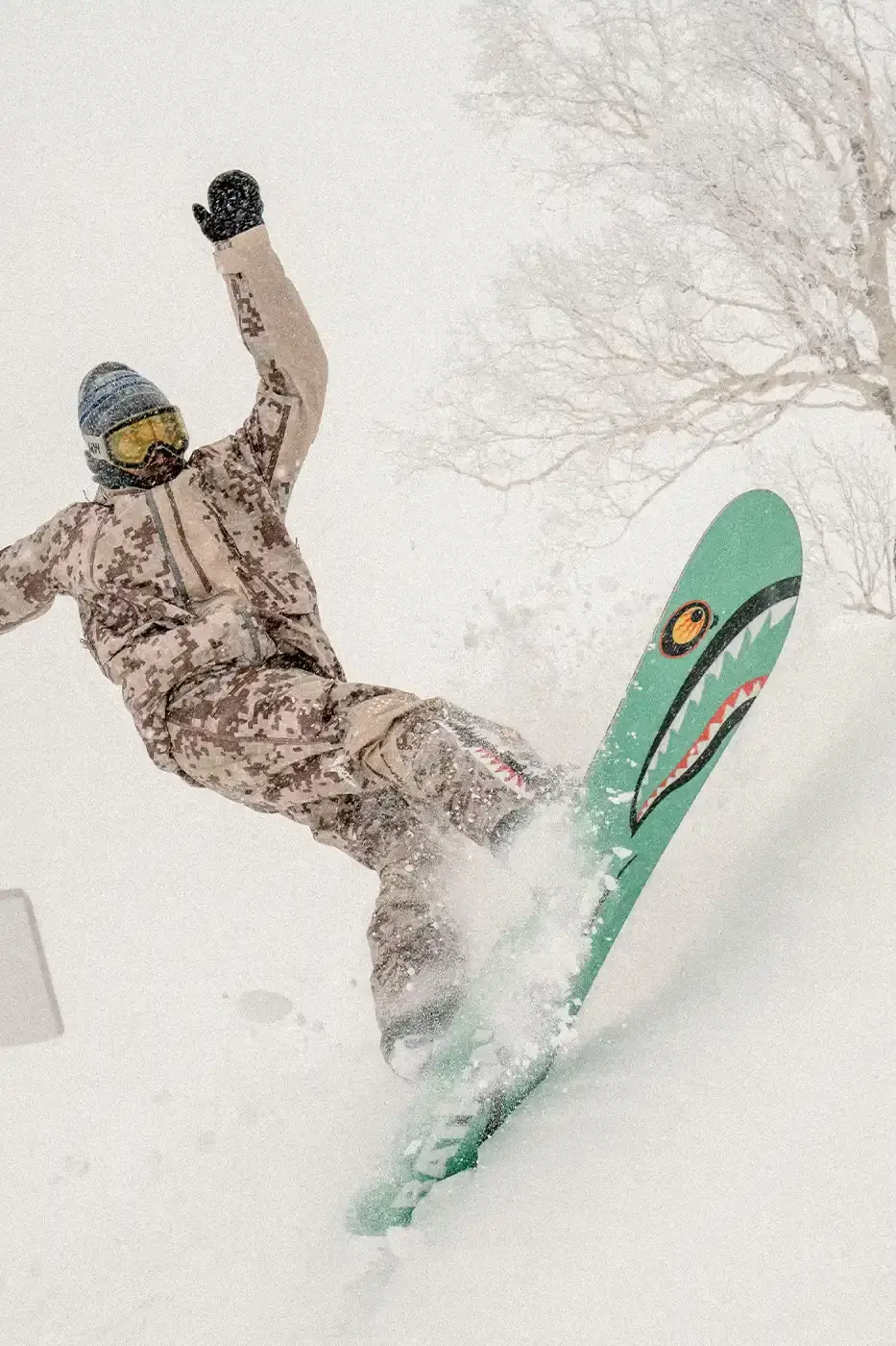 BAPE RELEASES FINAL PAW WINTER COLLECTION BAPE releases third Performance All Weather collection featuring technical snowboard jackets, overalls, and accessories with new camouflage patterns designed for extreme winter conditions. (image 6 of 24)
