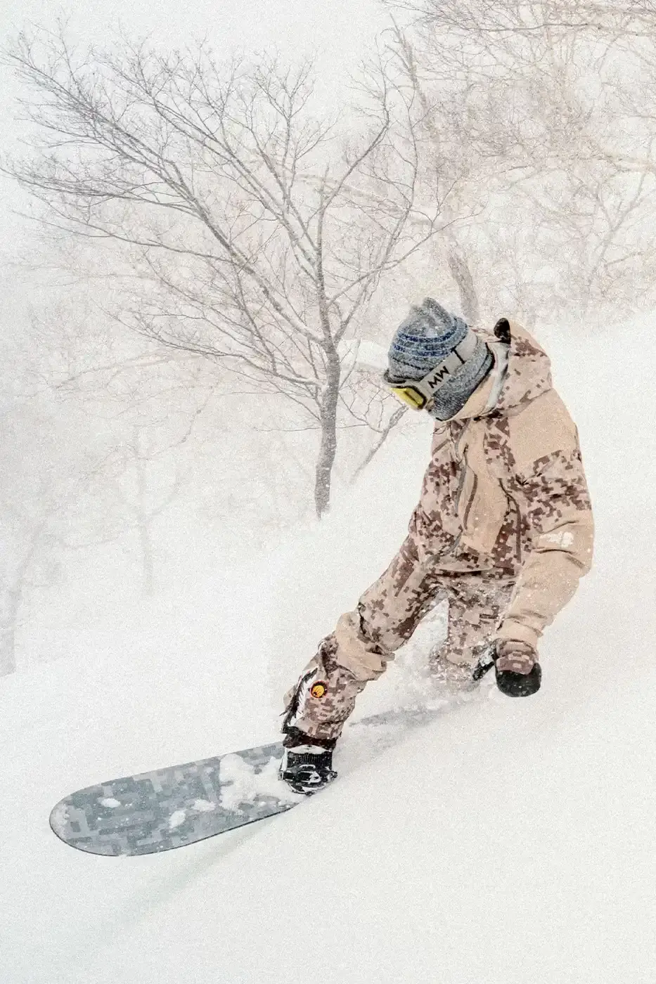 BAPE RELEASES FINAL PAW WINTER COLLECTION BAPE releases third Performance All Weather collection featuring technical snowboard jackets, overalls, and accessories with new camouflage patterns designed for extreme winter conditions. (image 5 of 24)