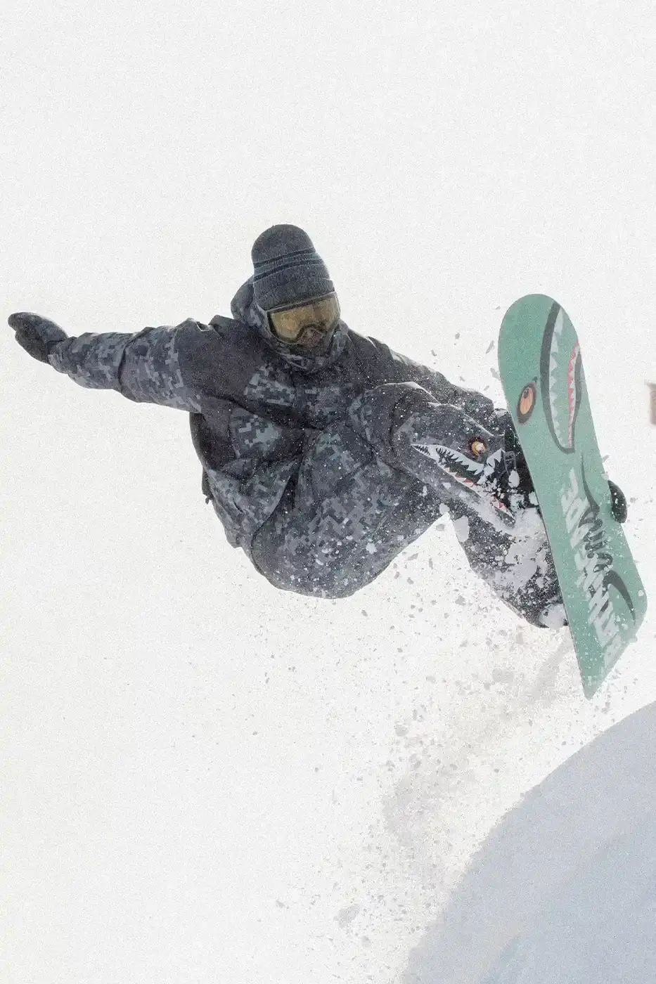 BAPE RELEASES FINAL PAW WINTER COLLECTION BAPE releases third Performance All Weather collection featuring technical snowboard jackets, overalls, and accessories with new camouflage patterns designed for extreme winter conditions.