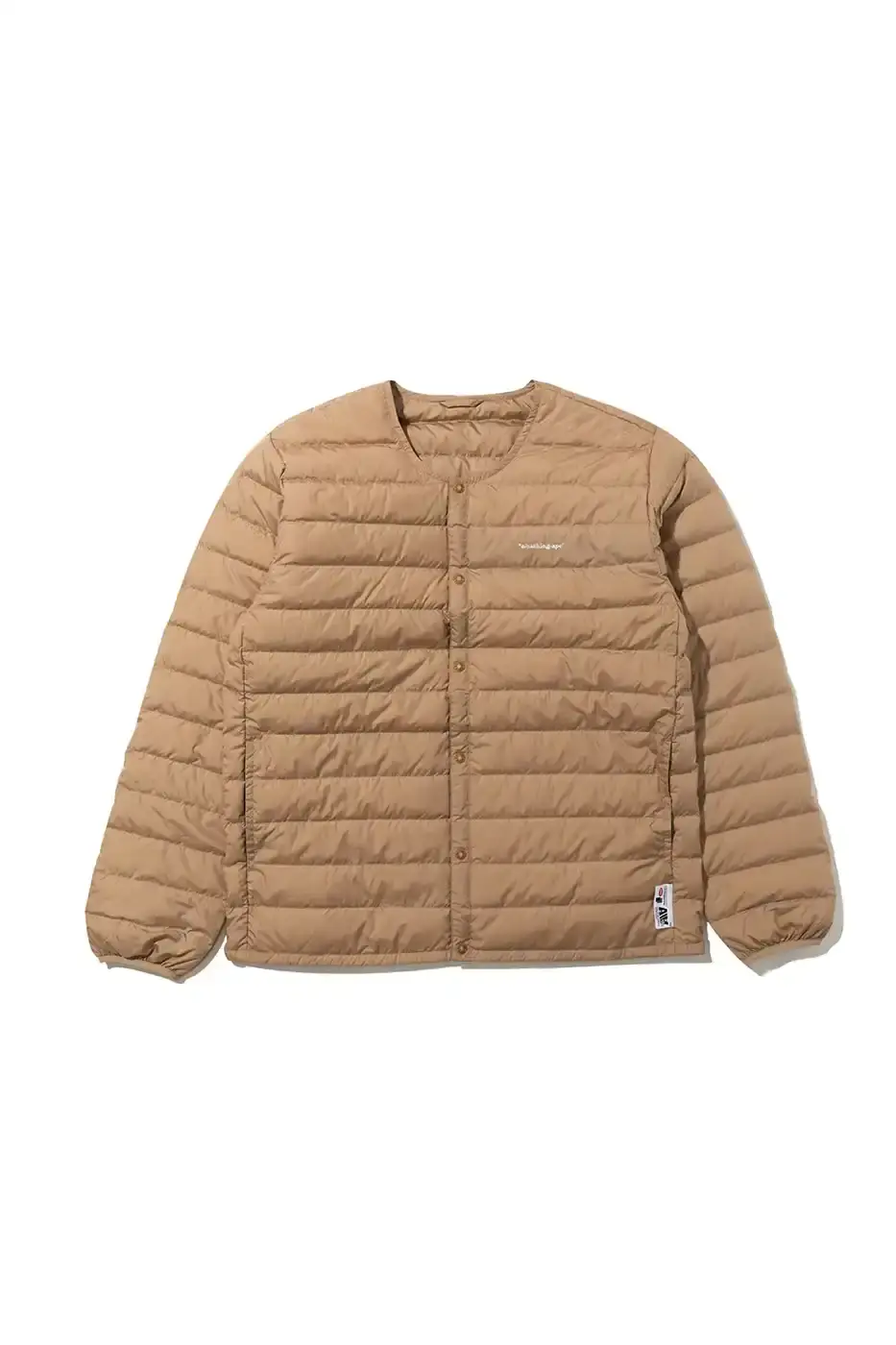 BAPE RELEASES FINAL PAW WINTER COLLECTION BAPE releases third Performance All Weather collection featuring technical snowboard jackets, overalls, and accessories with new camouflage patterns designed for extreme winter conditions. (image 14 of 24)