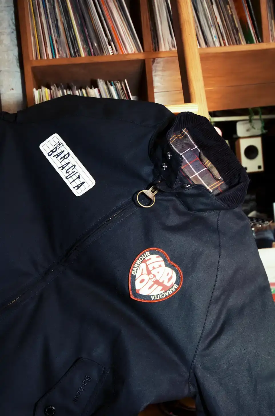 BARBOUR AND BARACUTA UNITE FOR NORTHERN SOUL COLLECTION Barbour and Baracuta release their third collaborative collection for Autumn Winter 2025, featuring outerwear and accessories inspired by Northern Soul culture and shot by photographer Normski. (image 2 of 6)