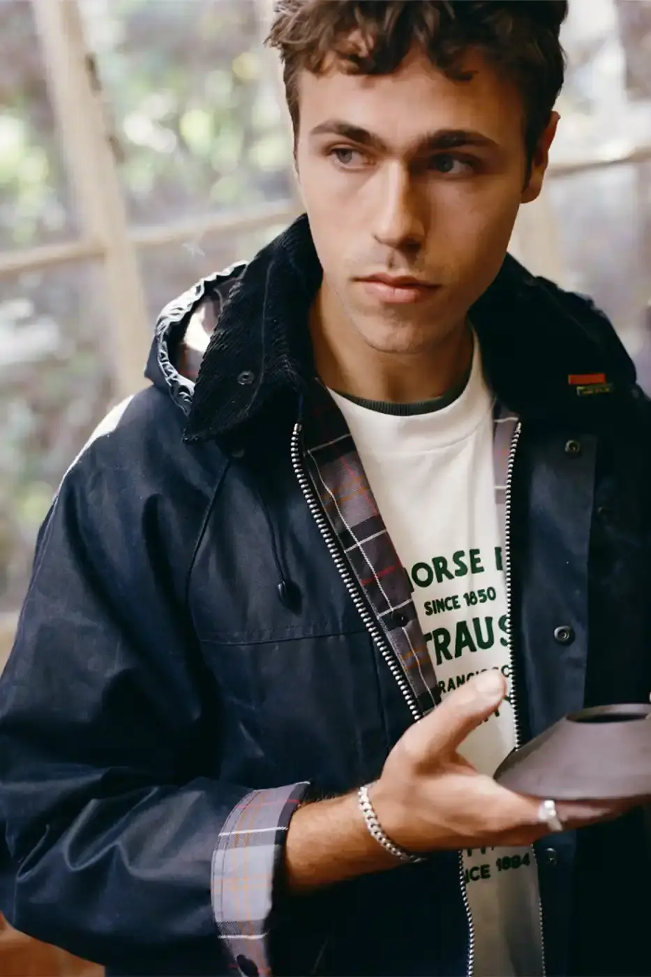 BARBOUR AND LEVI'S LAUNCH JOINT COLLECTION image about a new collaborative clothing collection between Barbour and Levi's combining their signature materials and design elements. (image 9 of 10)