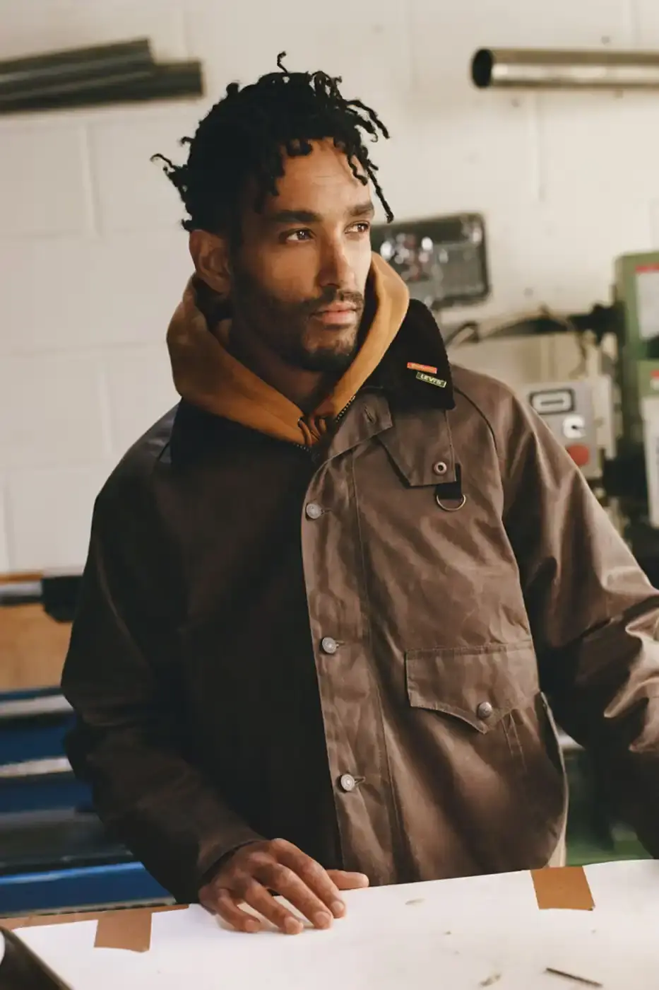 BARBOUR AND LEVI'S LAUNCH JOINT COLLECTION image about a new collaborative clothing collection between Barbour and Levi's combining their signature materials and design elements. (image 2 of 10)