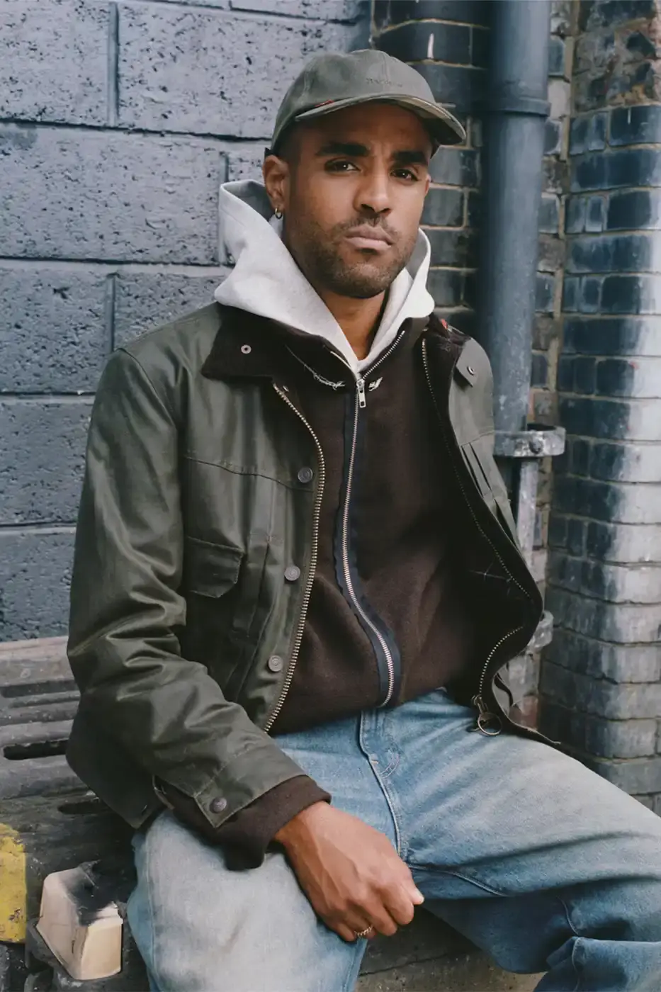 BARBOUR AND LEVI'S LAUNCH JOINT COLLECTION image about a new collaborative clothing collection between Barbour and Levi's combining their signature materials and design elements.