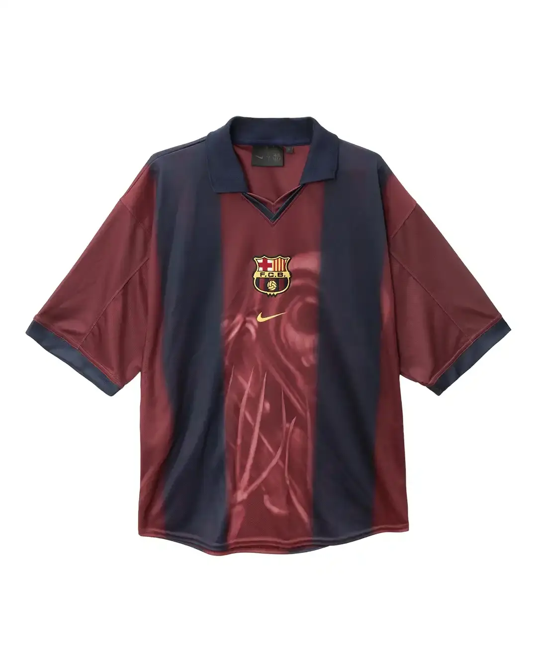 FC BARCELONA AND TRAVIS SCOTT TEAM UP FOR LIMITED COLLECTION image of the collaboration between FC Barcelona and Travis Scott, facilitated by Spotify. It details how the rapper designed a special kit featuring his Cactus Jack logo for the upcoming El Clásico match against Real Madrid on May 11. The article includes a quote from Scott about the partnership and describes the merchandise collection, which includes Nike-branded apparel with vintage-style acid washing. The collection continues Barcelona's tradition of featuring musical artists on special match kits through their Spotify partnership. (image 2 of 14)