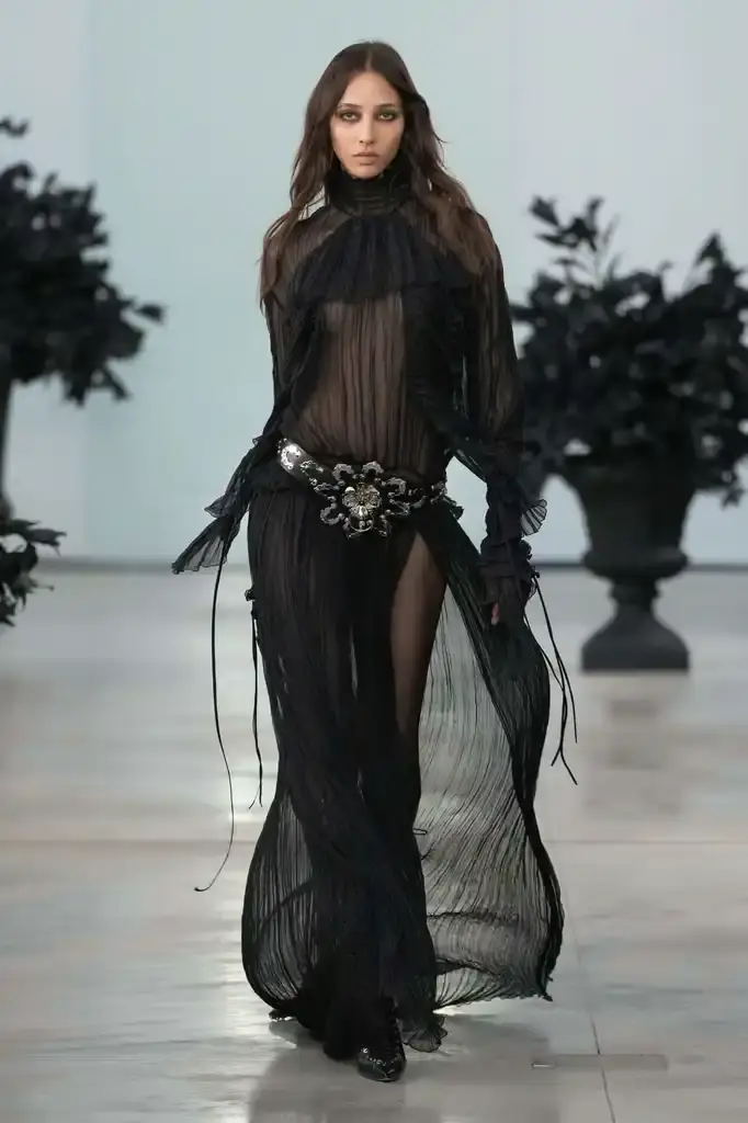 Blumarine - Fall-Winter2025 - 2026 - Womenswear - Italie - Milan - ©Launchmetrics/spotlight Models walking the runway at David Koma's debut Blumarine autumn/winter 2025 collection, showcasing sculptural neoprene pieces and bustier dresses in a palette of red, black, gray, and white against a minimalist backdrop at Milan Fashion Week. (image 3 of 20)