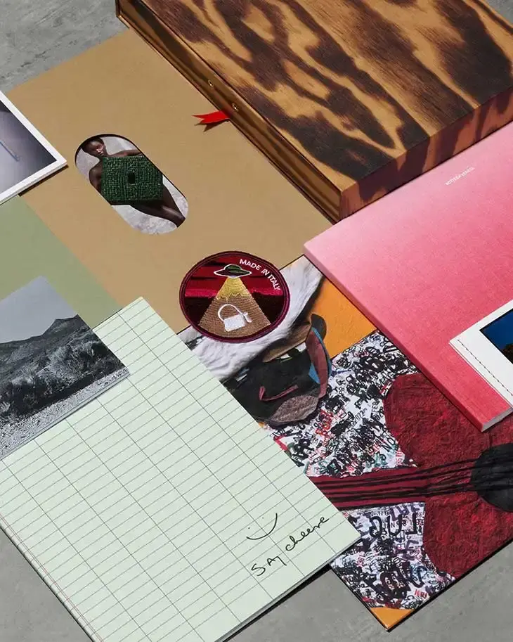 Bottega Veneta releases fifth edition of luxury fanzine, featuring Winter 24 collection. Multi-volume publication includes Alec Soth photography, Le Corbusier tribute, artist collaborations, and exclusive merchandise. Available free in stores worldwide, showcasing brand's creative process and artistic partnerships (image 2 of 5)