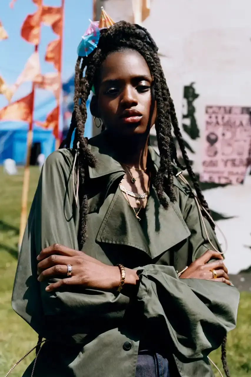 BURBERRY DROPS FESTIVAL COLLECTION FOR WEATHER EXTREMES image about Burberry's festival clothing collection designed for variable weather conditions. Covers campaign featuring multiple celebrities, product details including waterproof and lightweight options, and practical festival footwear. Content includes product descriptions, campaign visuals explanation, and shopping information for festival-goers seeking luxury outdoor wear. (image 20 of 31)