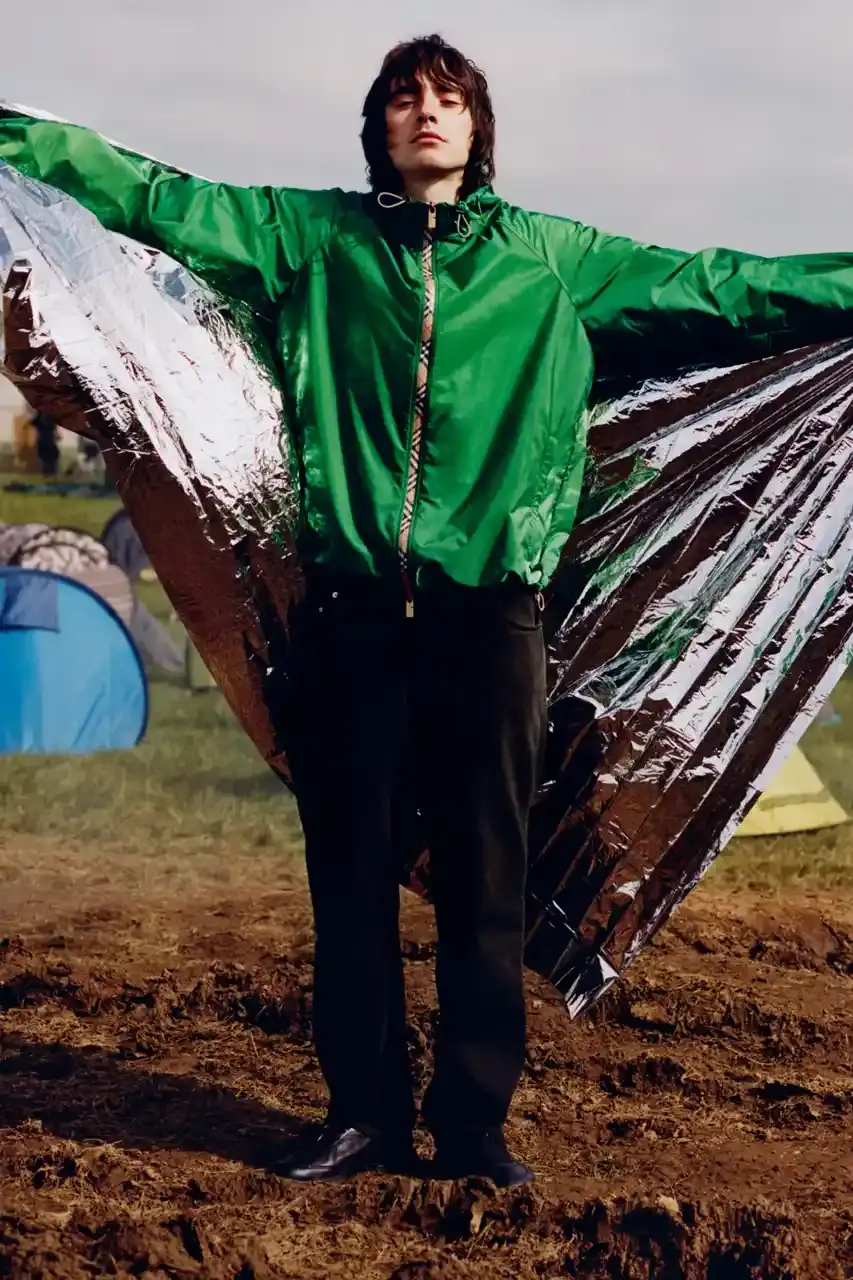 BURBERRY DROPS FESTIVAL COLLECTION FOR WEATHER EXTREMES image about Burberry's festival clothing collection designed for variable weather conditions. Covers campaign featuring multiple celebrities, product details including waterproof and lightweight options, and practical festival footwear. Content includes product descriptions, campaign visuals explanation, and shopping information for festival-goers seeking luxury outdoor wear. (image 25 of 31)