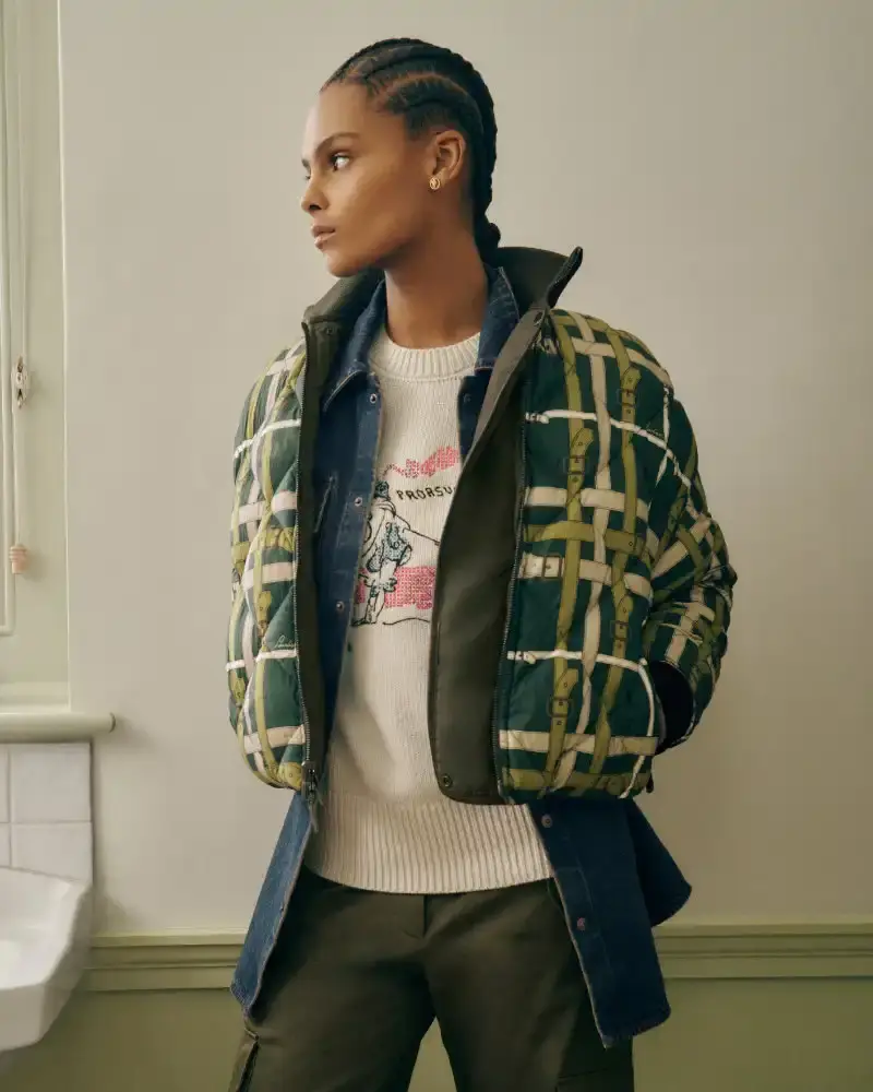 BURBERRY RETURNS TO HOUSE CODES FOR SPRING 2026 Article reviewing Burberry's Spring 2026 menswear collection, featuring heritage-inspired pieces including trench coats, knitwear, and accessories with signature house patterns. (image 15 of 19)