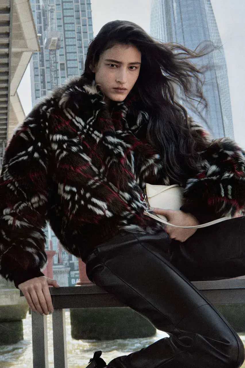 BURBERRY RELEASES WINTER 2026 CAMPAIGN image of the Burberry Winter 2026 fashion campaign starring FKA twigs and Romeo Beckham. (image 20 of 23)