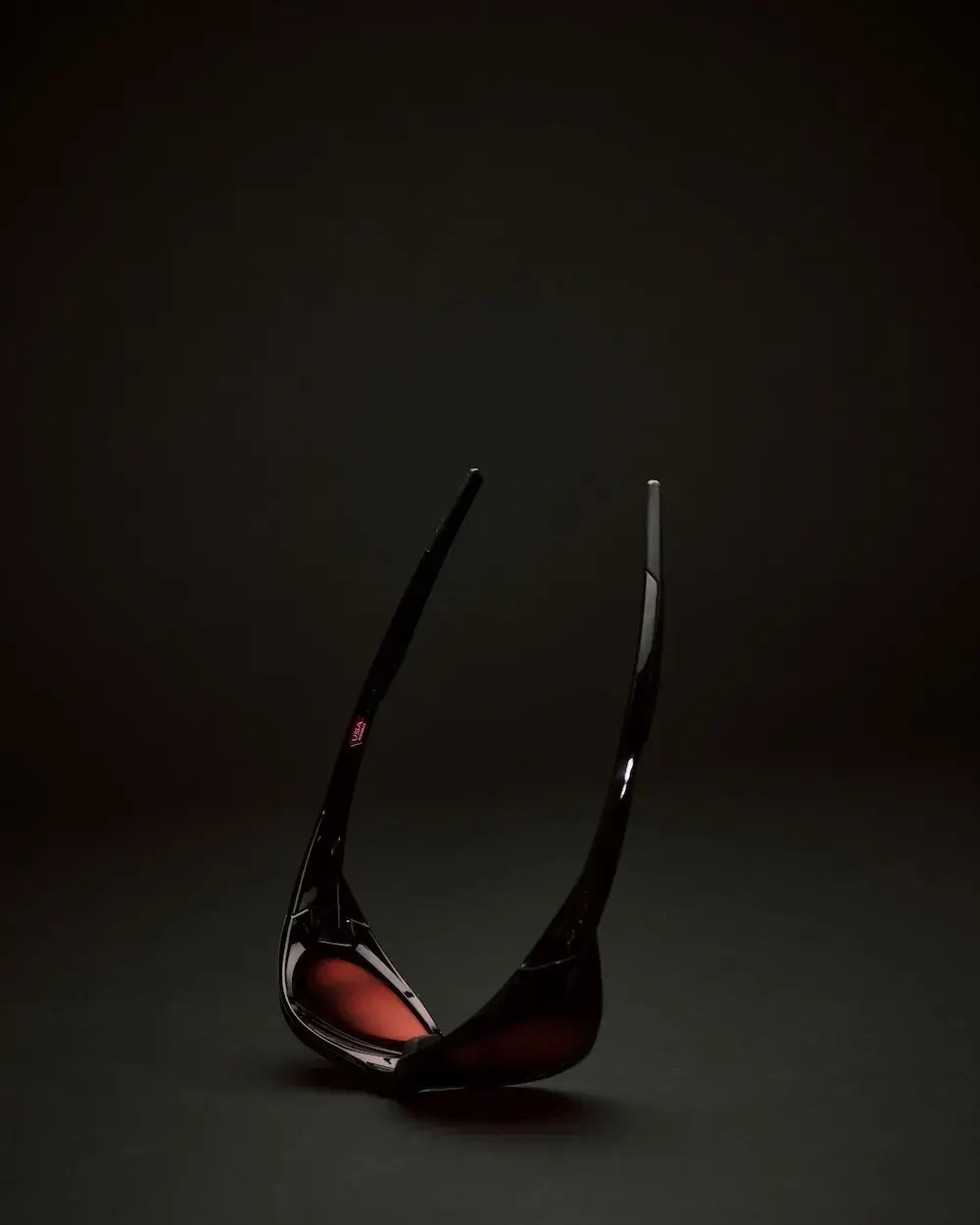TRAVIS SCOTT CACTUS JACK OAKLEY SUNGLASSES COLLECTION image of the Cactus Jack and Oakley eyewear collaboration, including frame specs, director credits, and purchase options. (image 3 of 4)