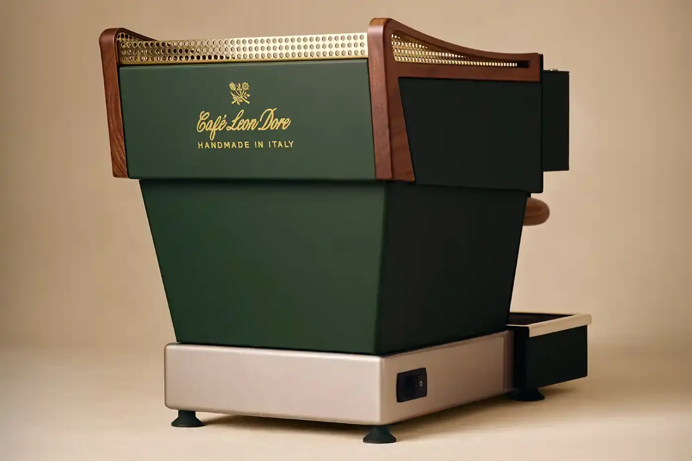 CAFÉ LEON DORE PARTNERS WITH LA MARZOCCO ON EXCLUSIVE COFFEE COLLECTION Image of the collaboration between Café Leon Dore (part of Aimé Leon Dore) and La Marzocco. The partnership features a custom-designed Linea Micra espresso machine in green with brass and walnut details, plus co-branded apparel including aprons, t-shirts, and hats. The collection is available exclusively through Aimé Leon Dore's stores and website. The article provides details about the machine's professional capabilities despite its compact size, and notes that it's being produced in limited quantities. (image 5 of 6)