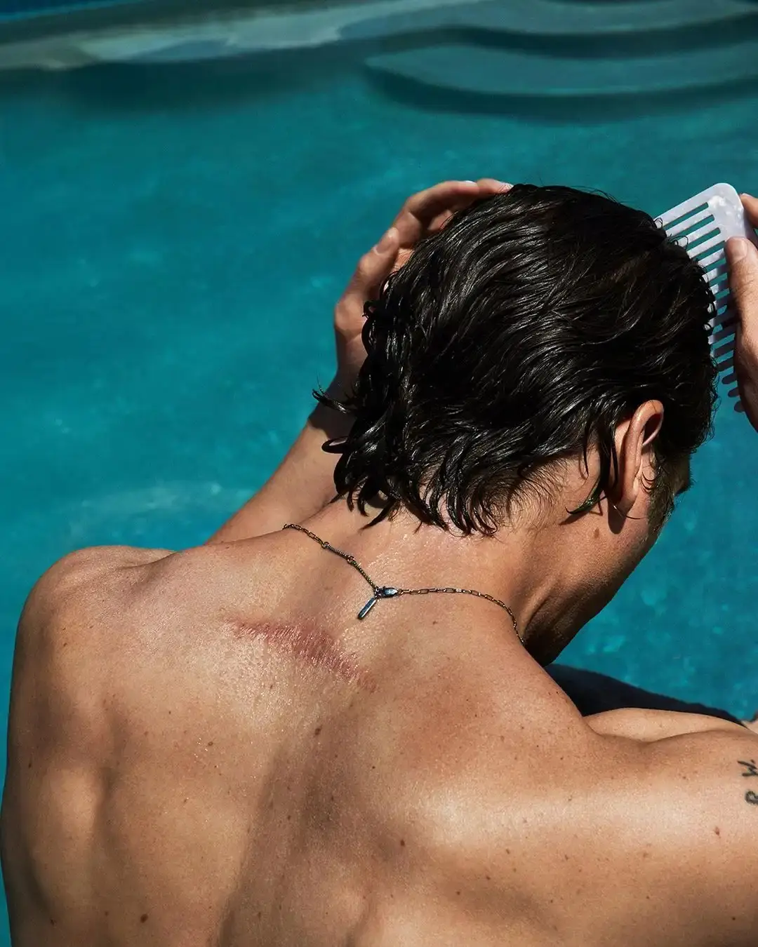 Jeremy Allen White combs his hair in Calvin Klein new campaign