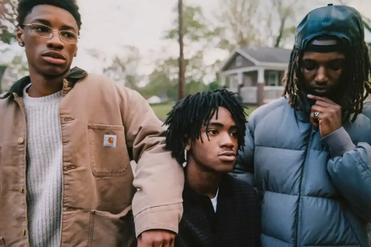 CARHARTT WIP FW25 CAMPAIGN SHOWS SUBURBAN LIFE image of Carhartt WIP Fall Winter 2025 campaign showing teenagers and dancer in Atlanta suburban neighborhood wearing OG Chore Coat and fleeces (image 7 of 8)