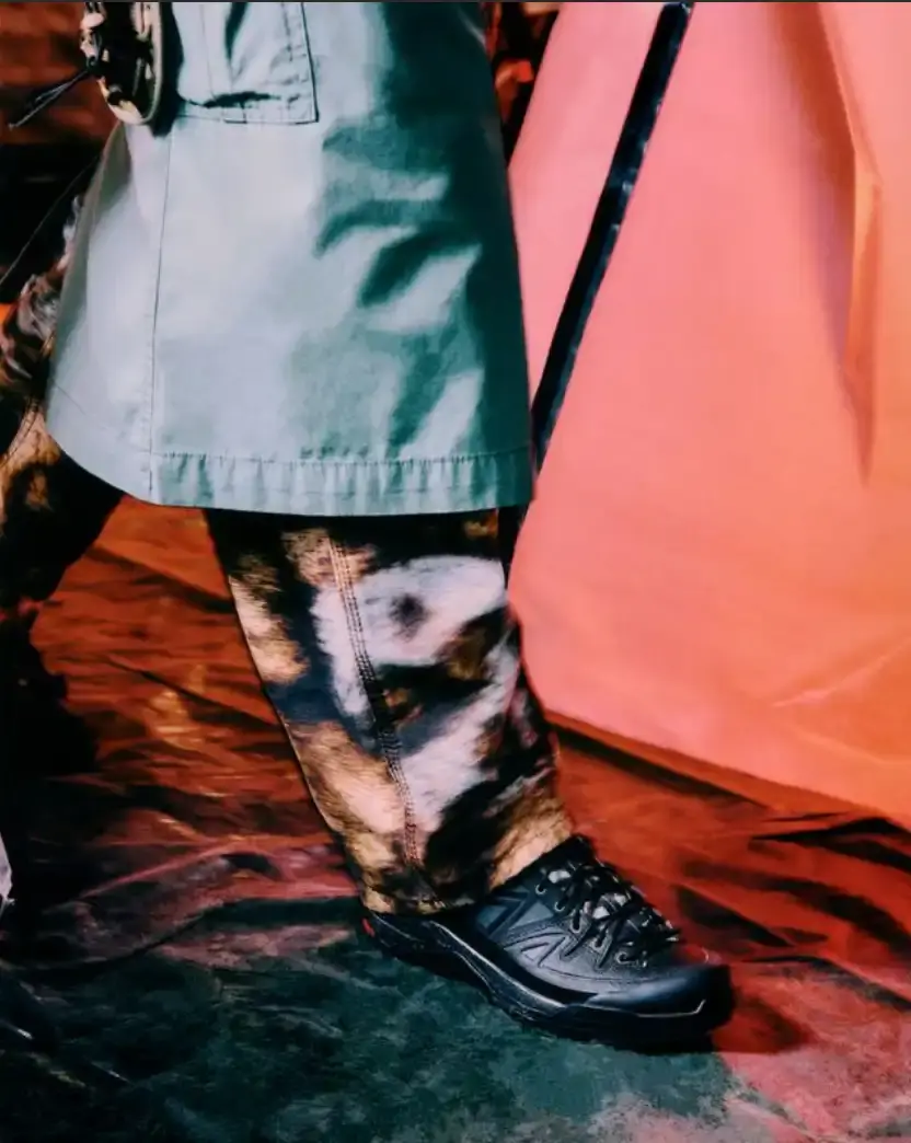 CARHARTT WIP AND SALOMON RELEASE X-ALP SNEAKER Carhartt WIP and Salomon collaborate on the X-ALP sneaker, featuring black leather upper with suede layers and camouflage details, releasing December 18.