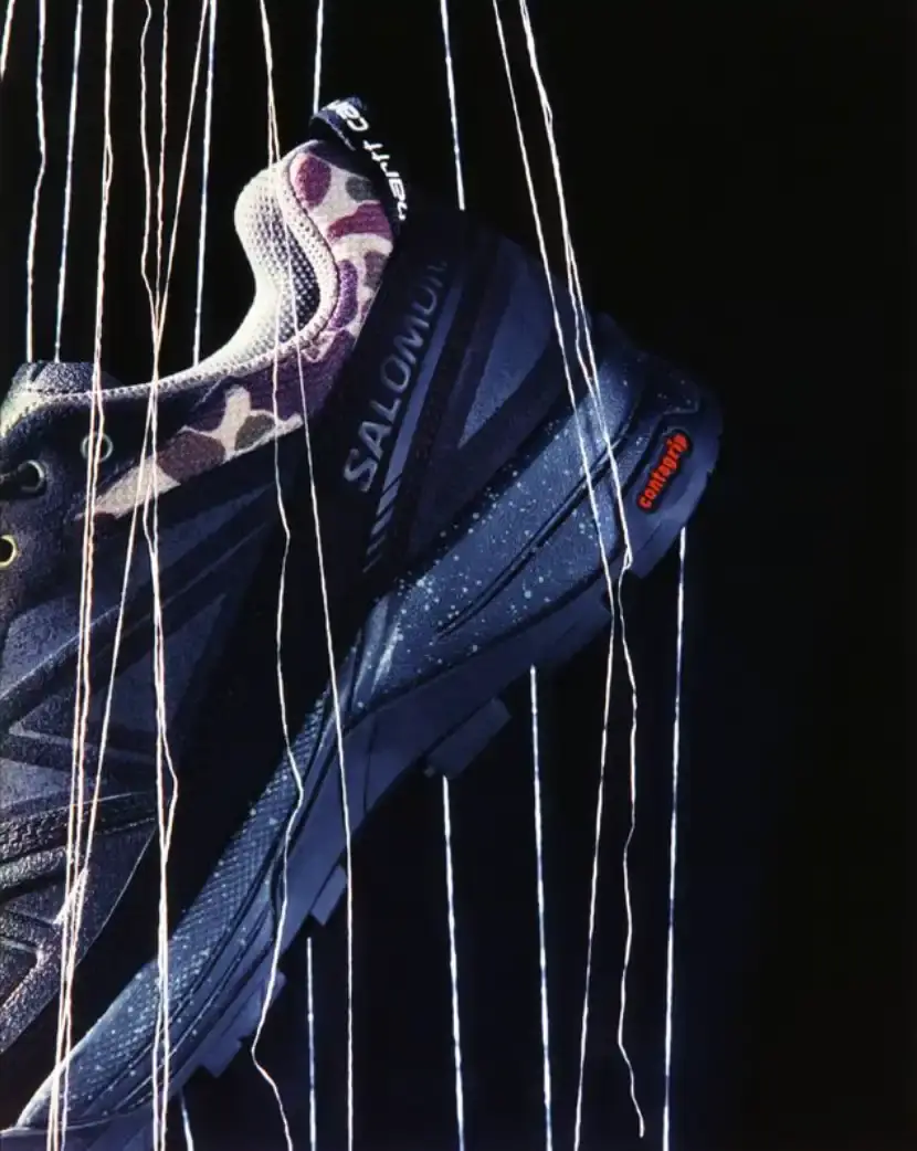 CARHARTT WIP AND SALOMON RELEASE X-ALP SNEAKER Carhartt WIP and Salomon collaborate on the X-ALP sneaker, featuring black leather upper with suede layers and camouflage details, releasing December 18. (image 6 of 6)