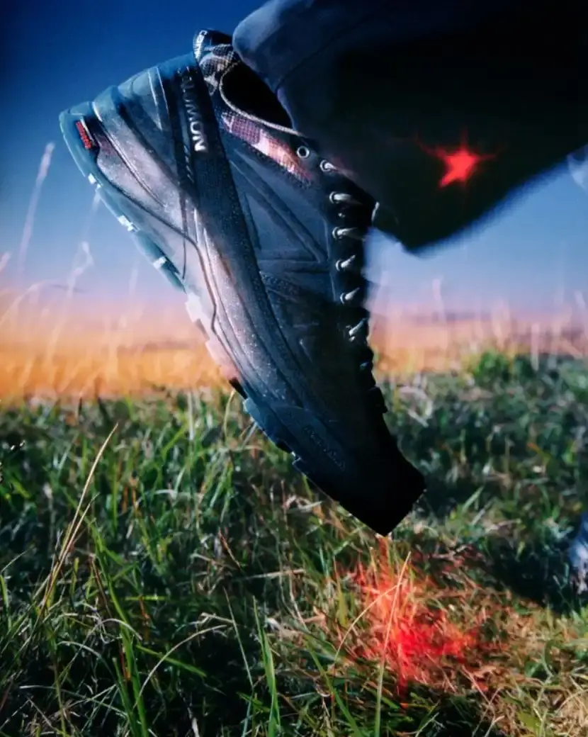CARHARTT WIP AND SALOMON RELEASE X-ALP SNEAKER Carhartt WIP and Salomon collaborate on the X-ALP sneaker, featuring black leather upper with suede layers and camouflage details, releasing December 18. (image 3 of 6)