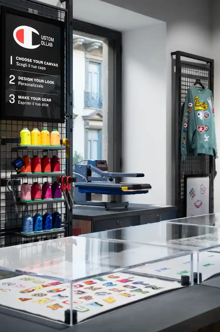 CHAMPION OPENS MILAN FLAGSHIP STORE Article about Champion's new Milan flagship store opening on Via Torino 19, with details on store layout, design concept, and community initiatives. (image 4 of 5)