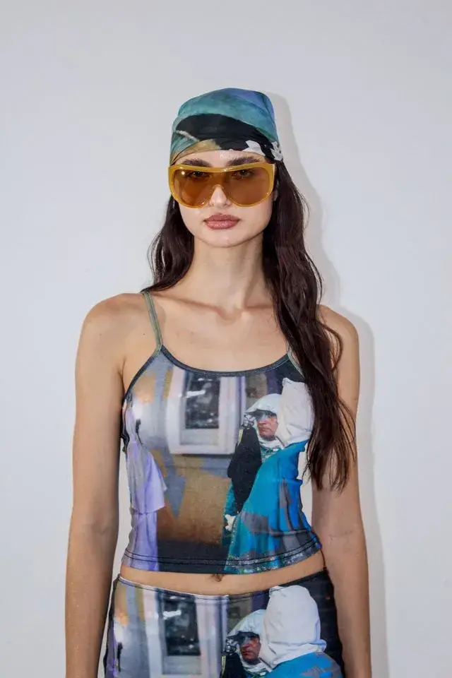 HROMATIQUE LAB DEBUTS SINNER SINNER! ON PARIS RUNWAY image about Chromatique Lab and its Spring/Summer 2027 collection SINNER SINNER!, the label's first runway show, held in Paris on October 7, 2026, with a livestream available. (image 9 of 14)
