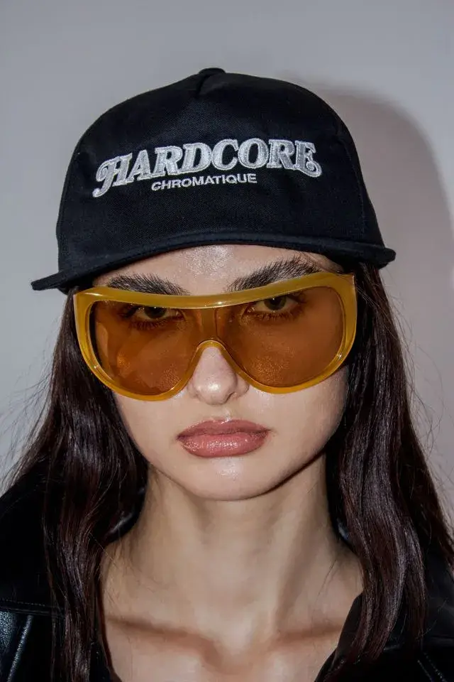 HROMATIQUE LAB DEBUTS SINNER SINNER! ON PARIS RUNWAY image about Chromatique Lab and its Spring/Summer 2027 collection SINNER SINNER!, the label's first runway show, held in Paris on October 7, 2026, with a livestream available. (image 12 of 14)