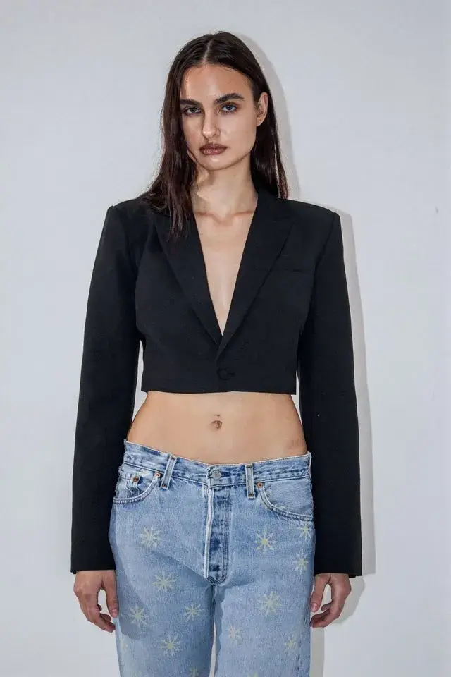 HROMATIQUE LAB DEBUTS SINNER SINNER! ON PARIS RUNWAY image about Chromatique Lab and its Spring/Summer 2027 collection SINNER SINNER!, the label's first runway show, held in Paris on October 7, 2026, with a livestream available. (image 10 of 14)