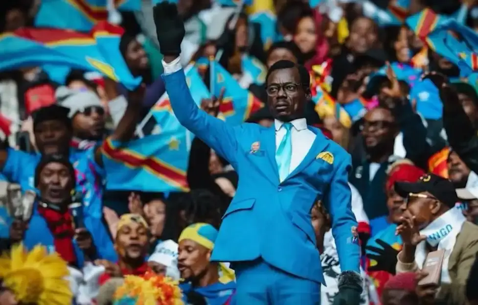 A Democratic Republic of Congo supporter maintained a statue-like pose throughout his team's Africa Cup of Nations matches, arm raised in tribute to independence leader Patrice Lumumba, who was assassinated in 1961 after denouncing Belgian colonial rule.